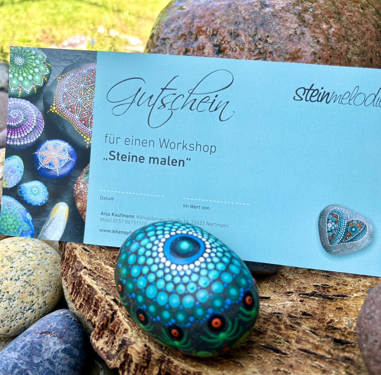 Gutschein mit bemalten Stein