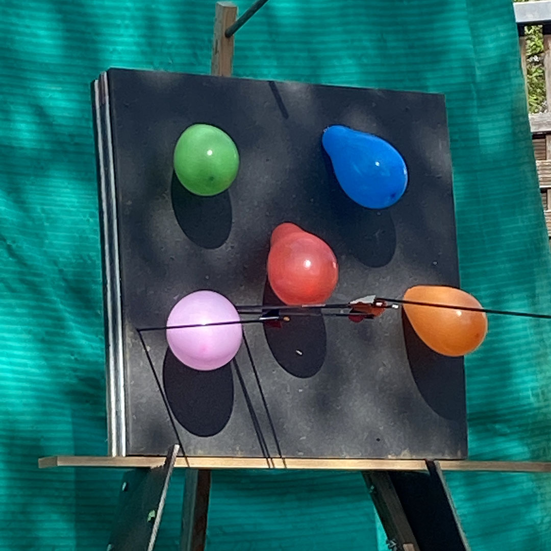 Luftballons an Zilescheibe gepinnt